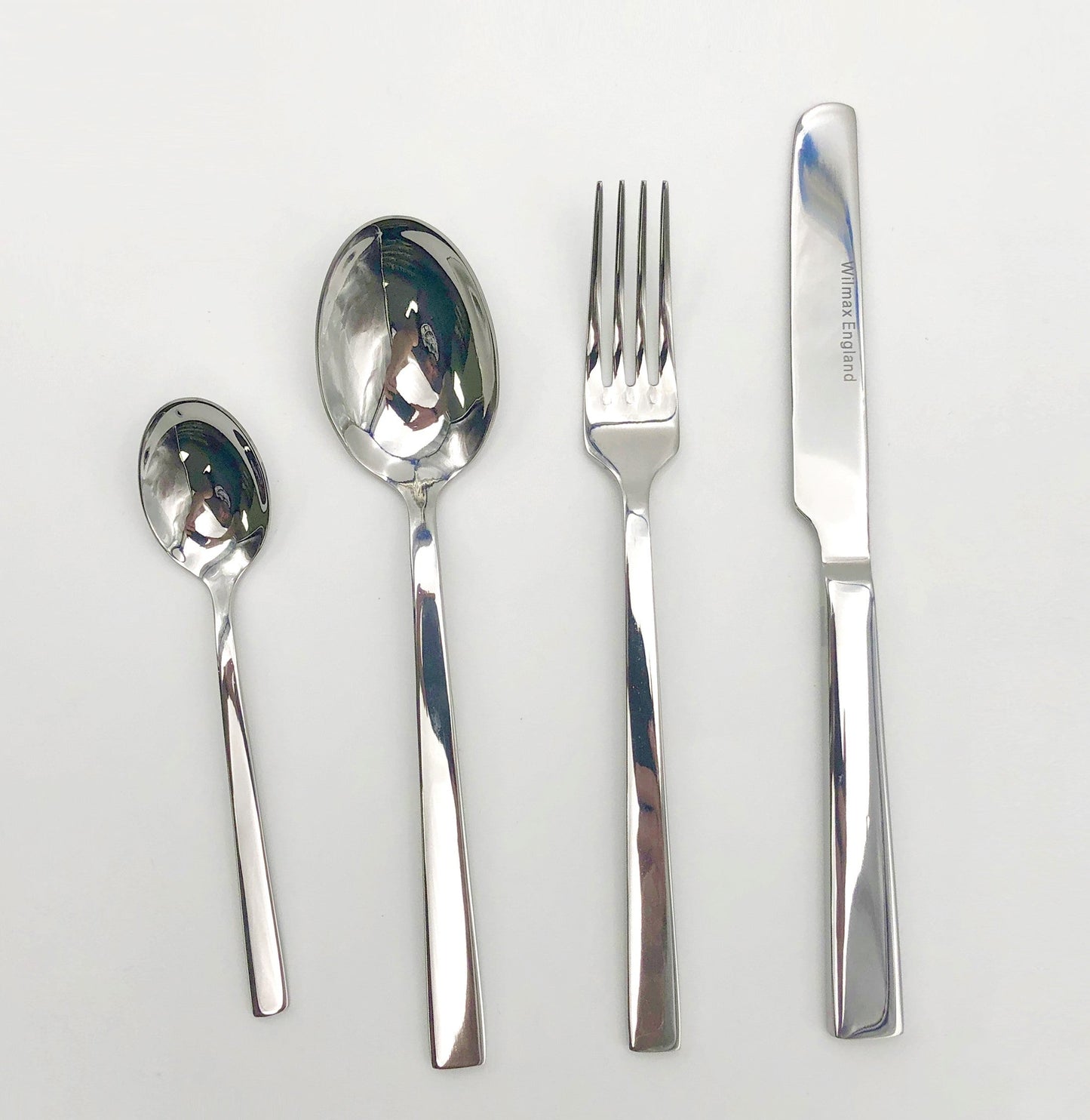 Four (4) Piece 18/10 Stainless Steel Dinner Set By With A Square Solid Handle-0